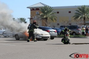 Engine 49 crew prepares to battle vehicle fire