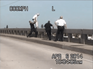 Deputies grab the 24 year-old suicidal subject from the railing of the Bay Pines Bridge